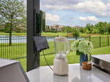 Edgemont Cove | Curved Outdoor Kitchen with Built-In Grill, Griddle & Pizza Oven angle 24